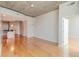 Bright living room with hardwood floors and concrete ceilings, showcasing an open layout perfect for modern living at 361 17Th St # 1516, Atlanta, GA 30363
