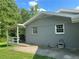 Covered back patio and well maintained lawn provide outdoor enjoyment at 3802 Macland Rd, Hiram, GA 30141