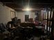 Unfinished basement area, featuring multiple sofas, seating, and storage at 3802 Macland Rd, Hiram, GA 30141