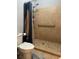 Bathroom features a walk-in shower, safety bar and tiled floor at 3802 Macland Rd, Hiram, GA 30141