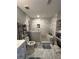 Modern bathroom with stylish tile, a walk-in shower, and open shelving at 3802 Macland Rd, Hiram, GA 30141