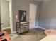 Cozy bedroom featuring a stylish mirrored cabinet and grey walls at 3802 Macland Rd, Hiram, GA 30141
