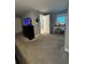 Bedroom features neutral walls, plush carpeting, furniture pieces, and a window at 3802 Macland Rd, Hiram, GA 30141