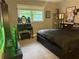 Bedroom with sleek black furniture and a modern aesthetic at 3802 Macland Rd, Hiram, GA 30141