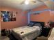 Bedroom with a queen bed, unique wall decor, and modern lighting at 3802 Macland Rd, Hiram, GA 30141