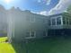 Exterior side view of home with multiple windows, lawn, and sunroom at 3802 Macland Rd, Hiram, GA 30141