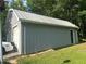 The property features a large garage with a side entrance door at 3802 Macland Rd, Hiram, GA 30141