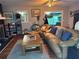 Inviting living room with hardwood floors, brick fireplace, and comfortable seating at 3802 Macland Rd, Hiram, GA 30141