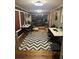 Inviting living room features hardwood floors and comfortable furniture at 3802 Macland Rd, Hiram, GA 30141