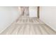 Long upstairs hallway features carpet and access to multiple rooms at 7644 Watson Cir, Locust Grove, GA 30248