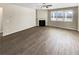 Bright living room featuring a fireplace, and hardwood floors at 7644 Watson Cir, Locust Grove, GA 30248