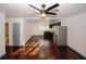 Spacious living area connecting the kitchen and a bathroom with modern fixtures at 8325 Attleboro Dr, Jonesboro, GA 30238
