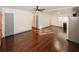 Spacious open-plan living area featuring sleek hardwood floors and plenty of natural light at 8325 Attleboro Dr, Jonesboro, GA 30238