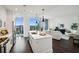 Modern kitchen with island and city views offers stainless steel appliances and lots of natural light at 1080 Peachtree Ne St # 2309, Atlanta, GA 30309