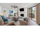 Inviting living room featuring modern finishes, a fireplace, and abundant natural light at 1379 Keys Lake Ne Dr, Brookhaven, GA 30319