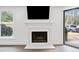 Living room showing fireplace and modern finishes at 1379 Keys Lake Ne Dr, Brookhaven, GA 30319