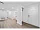 Bright, open-concept living space with modern flooring and fresh paint throughout at 1379 Keys Lake Ne Dr, Brookhaven, GA 30319