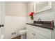 Renovated bathroom with white subway tile and granite countertop at 2128 Jones Nw Rd, Atlanta, GA 30318