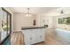 Open dining room showcasing island and fireplace at 2128 Jones Nw Rd, Atlanta, GA 30318