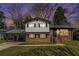 Charming two-story home with brick and siding exterior, plus a convenient covered carport at 2128 Jones Nw Rd, Atlanta, GA 30318