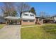 Charming two-story home with brick and siding exterior, plus a convenient covered carport at 2128 Jones Nw Rd, Atlanta, GA 30318