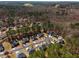 Beautiful aerial view of a well-planned residential community surrounded by trees and nature at 3876 Elm Trace Ct, Loganville, GA 30052