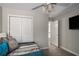 Bedroom featuring a ceiling fan and closet space at 3876 Elm Trace Ct, Loganville, GA 30052