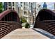 Picturesque wooden bridge providing a unique view of nearby apartments at 390 17Th Nw St # 2025, Atlanta, GA 30363