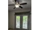 Room with natural light and french doors leading to patio with peaceful view at 390 17Th Nw St # 2025, Atlanta, GA 30363