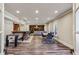 Finished basement featuring a bar, entertainment area, and wood-look flooring at 2298 Greenglade Ne Rd, Atlanta, GA 30345