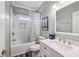 Clean bathroom featuring a tub with shower, white vanity, and gray walls at 2298 Greenglade Ne Rd, Atlanta, GA 30345