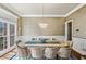 Formal dining room featuring wainscoting, and a chandelier at 2298 Greenglade Ne Rd, Atlanta, GA 30345