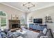 Bright living room featuring a stone fireplace at 2298 Greenglade Ne Rd, Atlanta, GA 30345