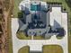 Stunning aerial view of the luxury home with a pool, landscaped grounds, and expansive driveway at 4100 Oak Hill Rd, Douglasville, GA 30135