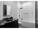 Modern bathroom featuring beautiful shower and a sleek vanity at 4100 Oak Hill Rd, Douglasville, GA 30135