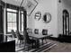 Dining area with black table, striped rug, and stunning chandelier fixture at 4100 Oak Hill Rd, Douglasville, GA 30135