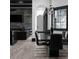 Open dining room with fireplace and modern decor with view to the hall at 4100 Oak Hill Rd, Douglasville, GA 30135