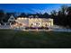 Breathtaking view of home exterior, including pool, hardscape and landscaped backyard at 4100 Oak Hill Rd, Douglasville, GA 30135