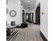 View of the long hallway featuring unique light fixtures and an arched entry at 4100 Oak Hill Rd, Douglasville, GA 30135