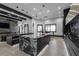 Spacious kitchen with modern black cabinetry, marble island, and abundant natural light at 4100 Oak Hill Rd, Douglasville, GA 30135