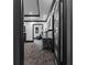 Wet bar and seating area, accessible through a doorway with black trim at 4100 Oak Hill Rd, Douglasville, GA 30135