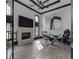 Stylish office with fireplace, large TV, statement art, and modern desk area at 4100 Oak Hill Rd, Douglasville, GA 30135