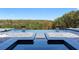 Beautiful pool and spa area with wooded views, offering a tranquil and luxurious outdoor experience at 4100 Oak Hill Rd, Douglasville, GA 30135