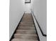 Staircase with wood treads, black risers and railings at 4100 Oak Hill Rd, Douglasville, GA 30135