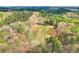 A beautiful home nestled within trees and a large open space at 4539 Tiffany Ln, Loganville, GA 30052