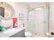 Updated bathroom features a glass enclosed shower, and modern fixtures at 4539 Tiffany Ln, Loganville, GA 30052