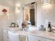 Bathroom featuring gorgeous countertop and lovely light fixtures at 4539 Tiffany Ln, Loganville, GA 30052