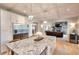 Open kitchen featuring an island with barstool seating and stainless steel refrigerator at 4539 Tiffany Ln, Loganville, GA 30052