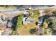 Aerial shot of the house showing the roof, lot and nearby road at 8989 E Cherokee Dr, Canton, GA 30115
