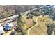 Aerial view of property showing its proximity to surrounding roads at 8989 E Cherokee Dr, Canton, GA 30115